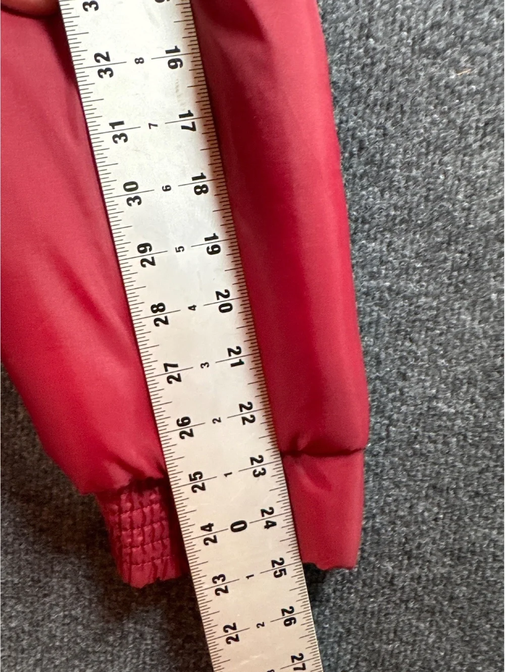 Red Quilted Puffer Jacket with Multiple Pockets and Zip Closure